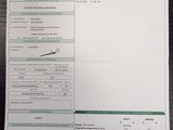 une photo d'un ticket de caisse sur lequel figure l'image d'un avion
