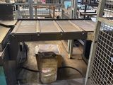 a table that is sitting in the middle of a room