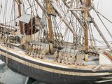 a model of a boat on display on the water