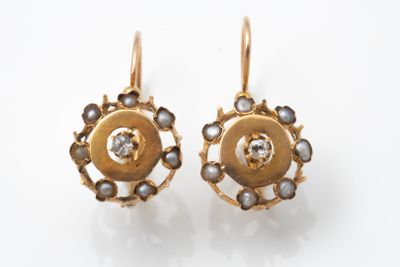 an image of a pair of earrings with pearls and diamonds