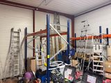 a picture of a garage with a lot of tools on the floor