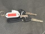 a bunch of keys that are laying on a table