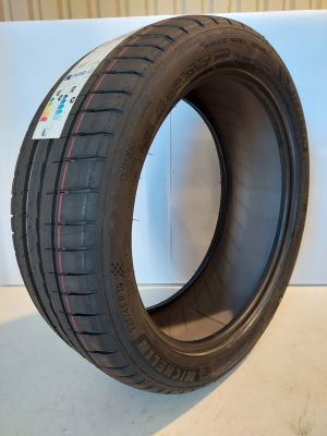 a close up of a tire on a white surface
