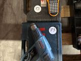 two tools that are sitting on a pallet