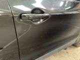 a close up of a door handle on a car