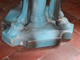 a statue of a person standing on top of a pedestal