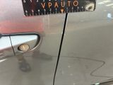 a sticker on the door of a car that says vauto