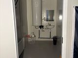 a bathroom with a sink and a toilet in it