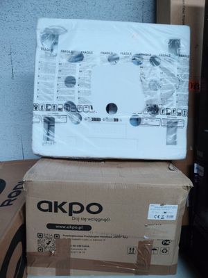 two boxes stacked on top of each other with a laptop on top of them