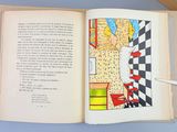 an open book with a picture of a woman in a kitchen