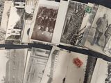 several old black and white photographs of men and women on a table