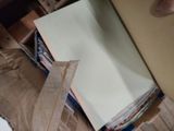 a piece of paper sitting on top of a cardboard box