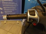 a close up of a motorcycle handle on display