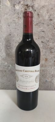 a bottle of wine that is sitting on a table
