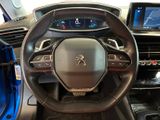 the interior of a car with a steering wheel and dashboard controls