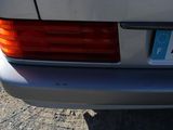a close up of a car with a license plate on the back of it