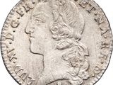 une pièce d'argent portant l'image d'une tête de femme