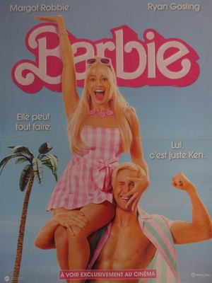 une affiche représentant Barbie et un homme sur la plage