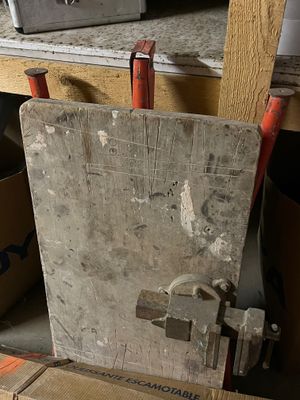 a piece of wood sitting on top of a box