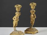 paire de figurines anciennes en laiton représentant un garçon et une fille