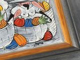 a picture of a painting of a bunny and a basket of fruit