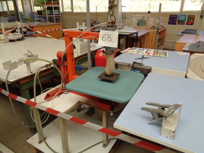 a table with a machine on it in the middle of a room