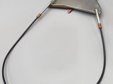 a close up of a metal object on a white surface