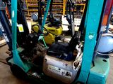 a fork lift truck with a blue back and a yellow back