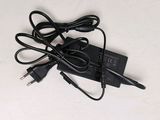 a charger that is plugged in to a laptop