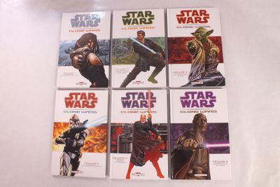 six livres de « Star Wars » posés sur une surface blanche