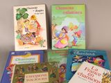 many children ' s books that are on the table