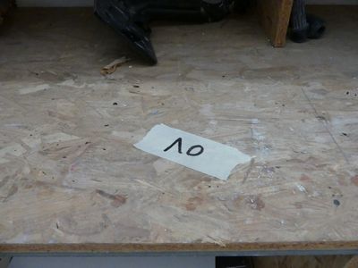 a sign on the floor that says ad on the floor
