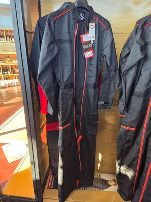 two jackets that are on display in a store