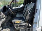 an image of the inside of a van with the door open