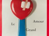 french movie poster of a broken heart with a bandage on it