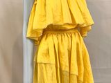 yellow ruffled dress on mannequin mannequin mannequin mannequin mannequin mannequin mannequin mannequin mannequin