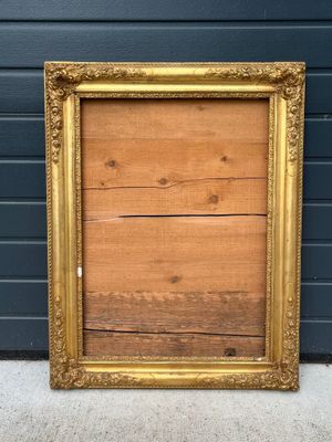 CADRE rectangulaire en bois mouluré, sculpté et doré (bronzi…