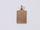 a small square pendant with a gold plate on a white background