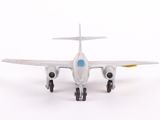 a toy airplane that is sitting on a white surface