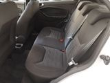 the back seats of a car with a seat belt in a car