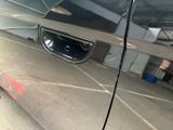 a close up of a door handle on a car