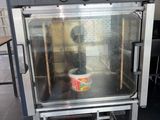 an oven with a bowl of food inside of it