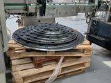 une image d'une machine qui travaille sur un morceau de bois