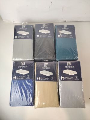 six paires de sous-vêtements pour homme sont posées sur une surface blanche