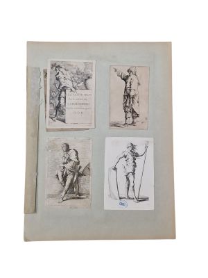 un vieux livre sur lequel figurent des dessins de personnes et d'animaux