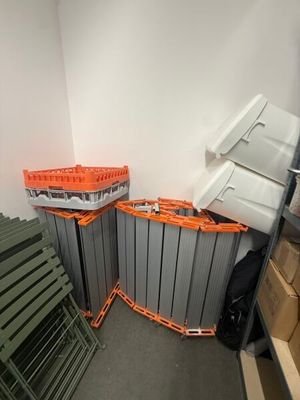 a room with a bunch of crates and crates on the floor