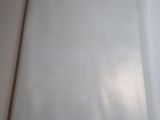 a piece of white paper on a white table