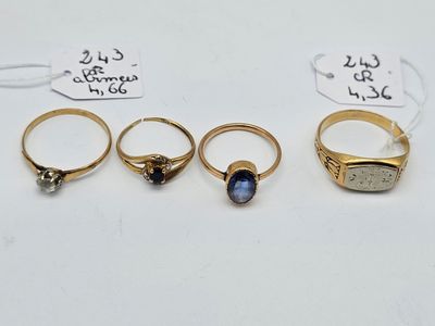 un ensemble de cinq bagues et une bague sertie d'une pierre
