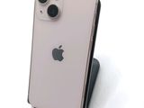 a close up of a cell phone with a camera on top of it
