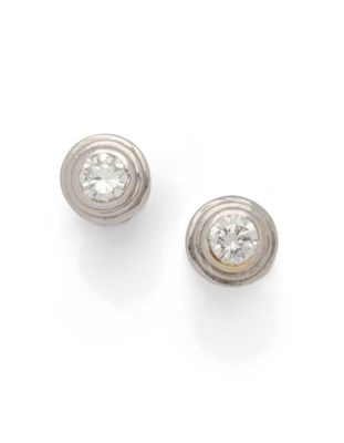 a pair of diamond stud earrings